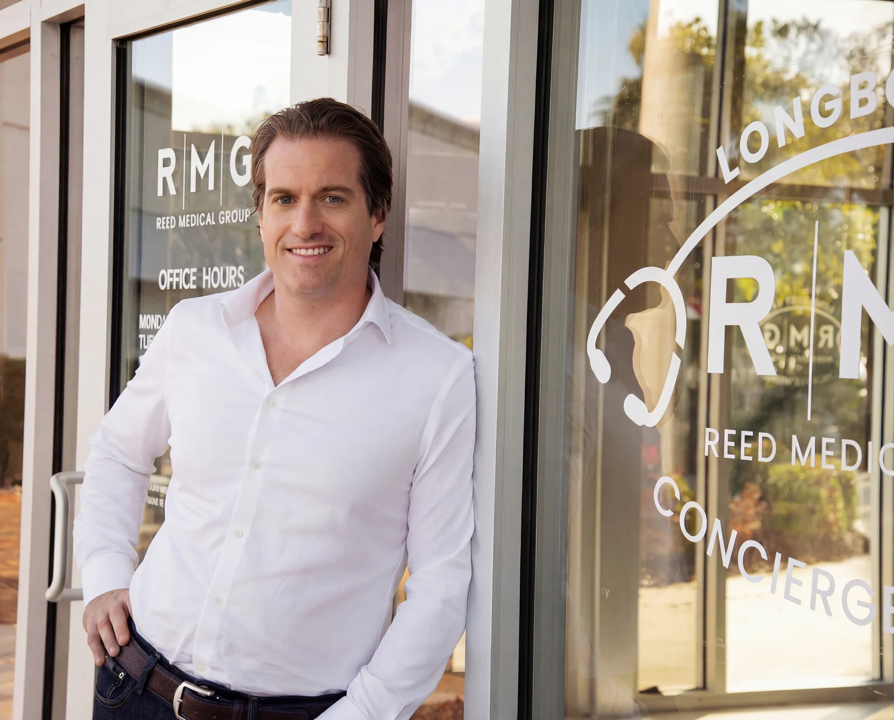 Dr. Reed outside Reed Medical Group’s Longboat Key medical office.
